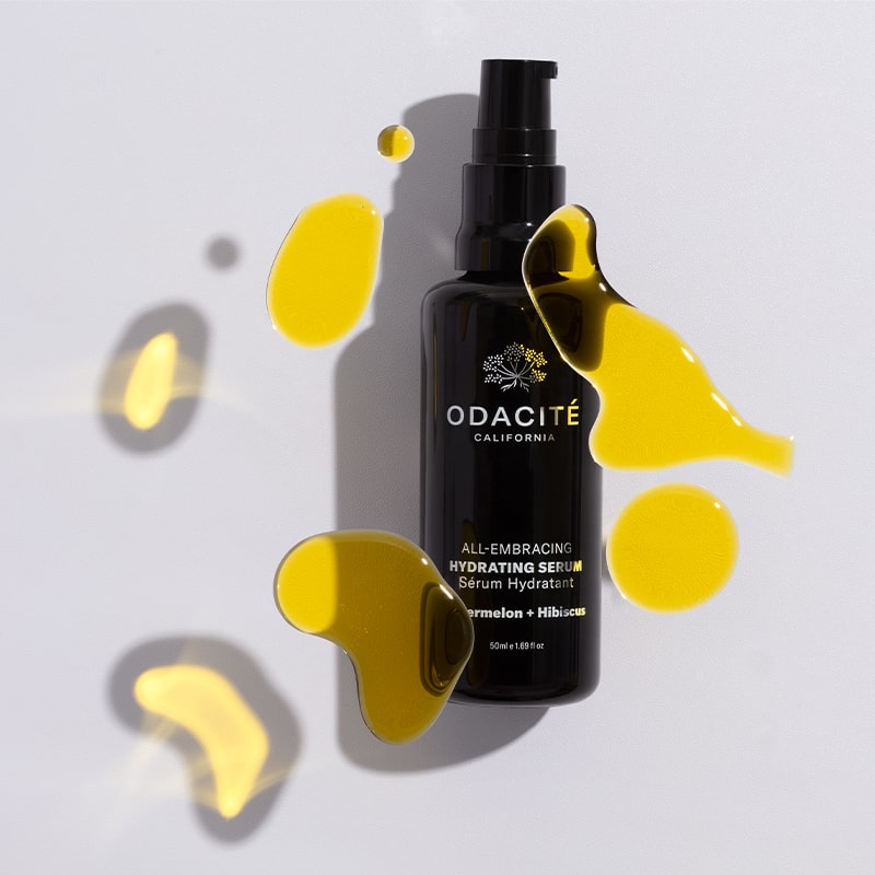 Odacite All-Embracing Hydrating Serum - product shown with serum swatches 