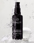 Odacite All-Embracing Hydrating Serum - product shown with water splashing on it