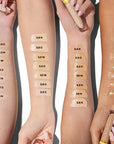 Kosas Cosmetics Revealer Concealer Super Creamy + Brightening Color Chart with color bars on model arms