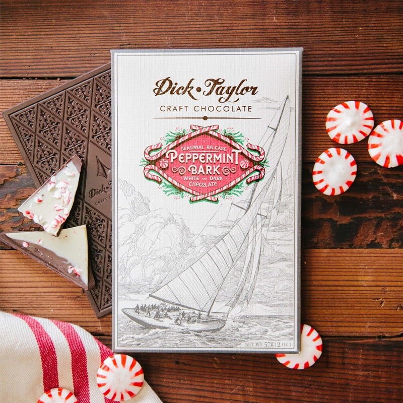 Dick Taylor Craft Chocolate Peppermint Bark White and Dark Chocolate - product shown next to peppermint candies and product packaging