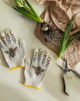 My Little Belleville Bee Gardening Gloves - products shown next to potting supplies and shears 