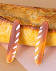 Jenny Lemons Baguette Hair Clip Set - hair clips shown resting on bread