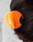 Jenny Lemons Orange Hair Claw - close up of product in models hair