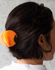 Jenny Lemons Orange Hair Claw - product shown in models hair