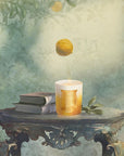 Trudon De Oro Candle - illustration of candle on table with books and a falling orange