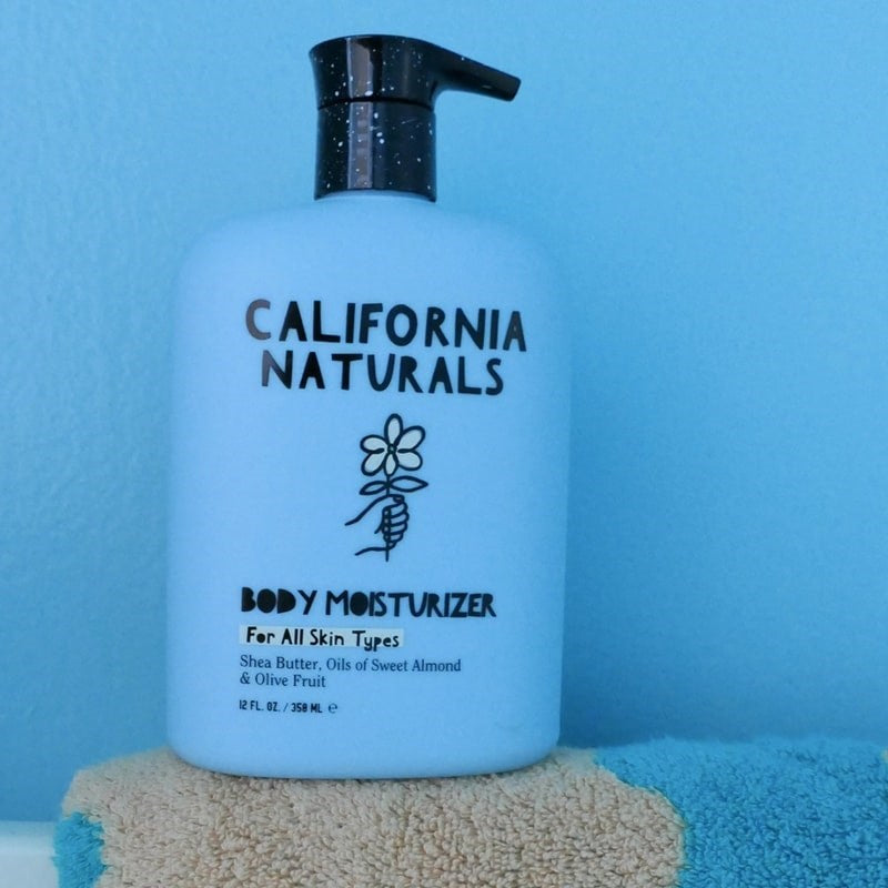 California Naturals Body Moisturizer - product shown on towel