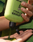 California Naturals  Super Moisture Body Wash - model dispensing product into hand