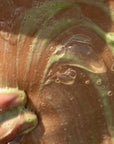 California Naturals  Super Moisture Body Wash - close up of model using body wash