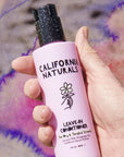 California Naturals Leave-in Conditioner - model holding product