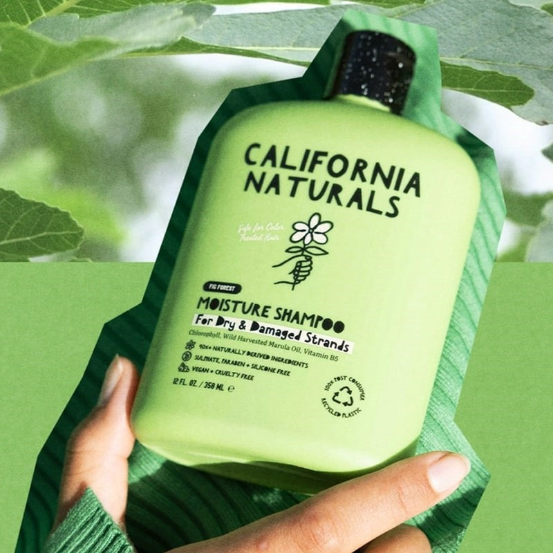 California Naturals Super Moisture Shampoo - model holding product