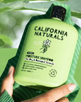 California Naturals Super Moisture Shampoo - model holding product