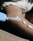 Lifestyle shot close up of diaper cream on child's leg