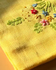 Seak Embroidered Tea Towel - Yellow - close up of product details