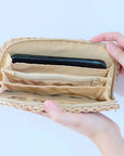 Seak Woven Clutch with Silk Tassel Key Chain - Blue - model shown opening purse showing interior