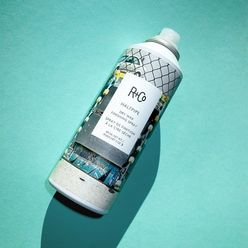 R+Co Halfpipe Dry Wax Finishing Spray - product shown on green background