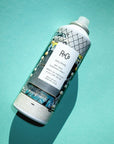R+Co Halfpipe Dry Wax Finishing Spray - product shown on green background