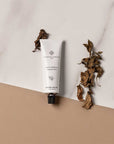 Essential Parfums Hand Cream - Bois Imperial - product next to fragrance ingredients 