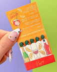 A Shop of Things Spritz Matches - model shown holding open matchbook