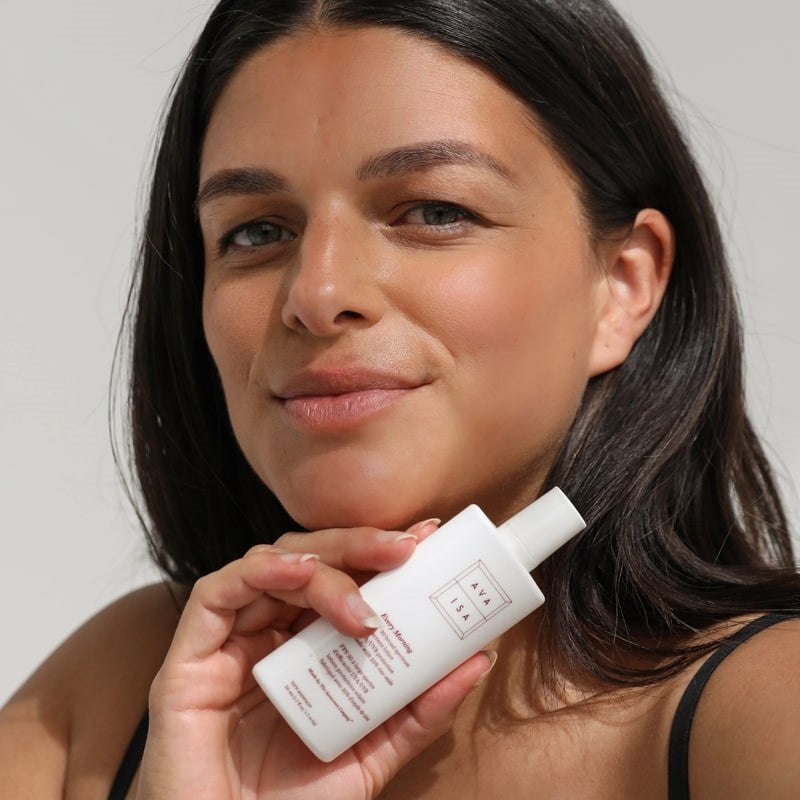 Ava Isa Every Morning Sunscreen SPF 30 - model shown holding product 