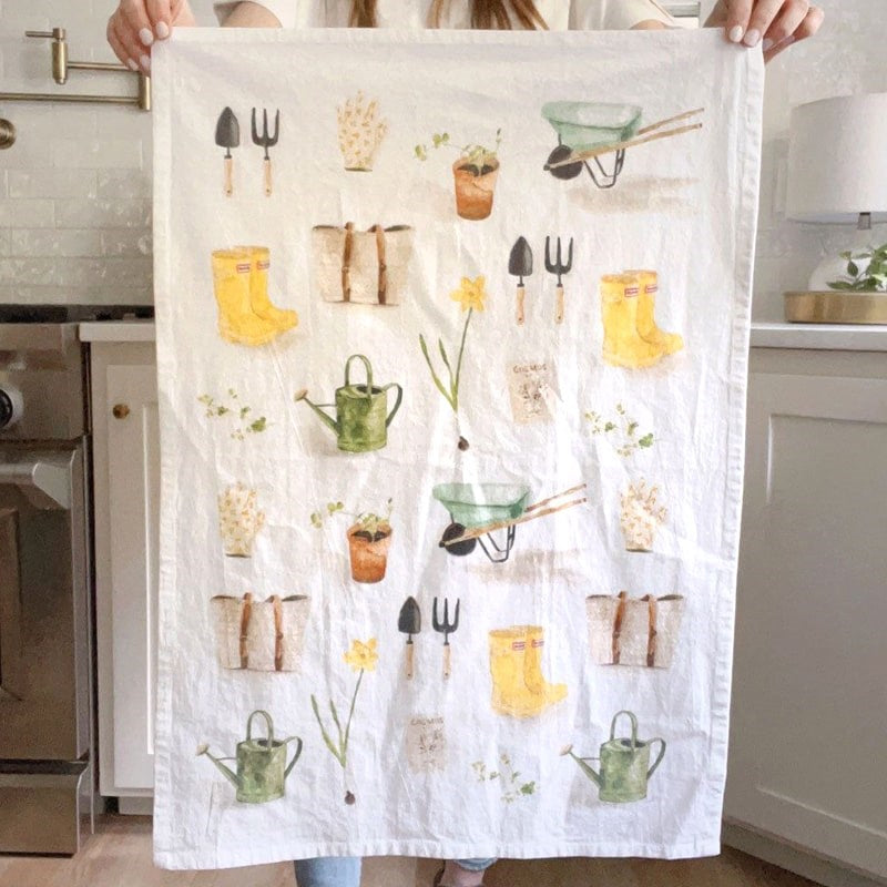 Emily Lex Studio Gardening Tea Towel - model shown holding tea towel showing full product