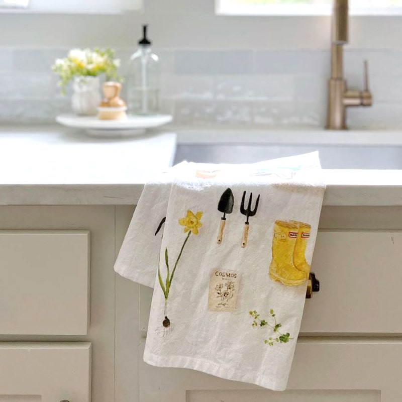 Emily Lex Studio Gardening Tea Towel - product shown hanging on kitchen sink