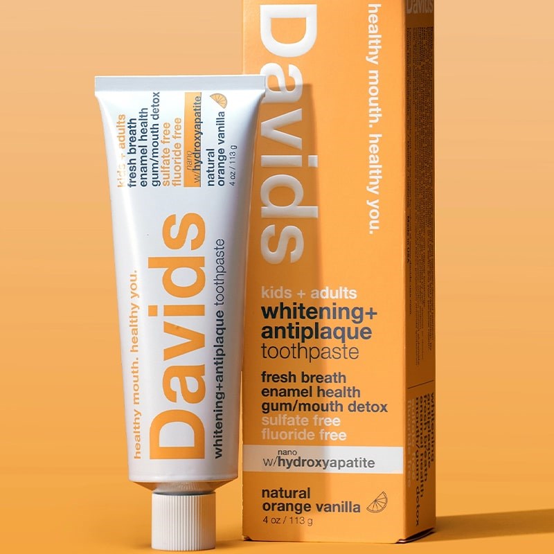 Davids Premium Toothpaste - Kids + Adults Nano-Hydroxyapatite Orange Vanilla - product shown next to packaging