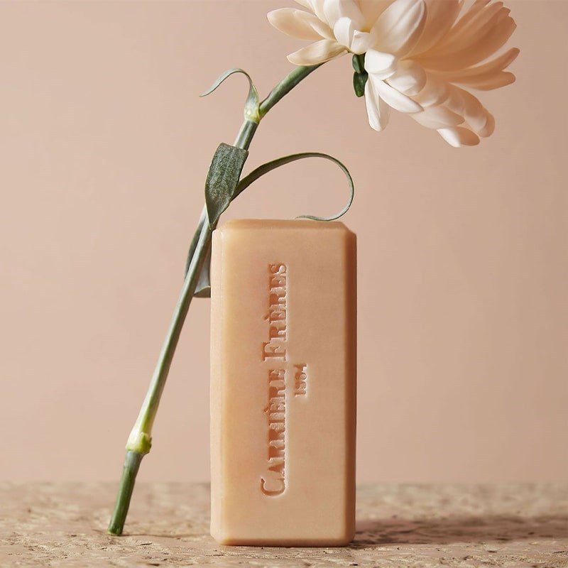 Carriere Freres Solid Body Soap - Florae - product shown with flower leaning against it