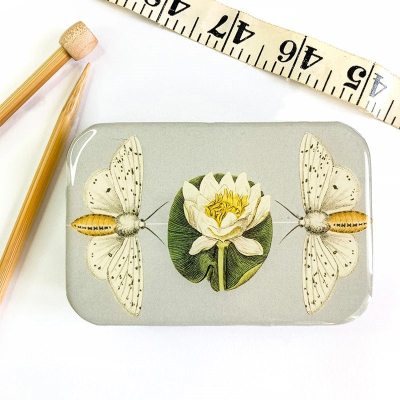 Firefly Notes Moth and Lotus Flower Storage Tin - Large - product shown next to measuring tape and sewing needles