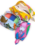 Baggu 3D Zip Set - Still Life - products shown filled with clothing