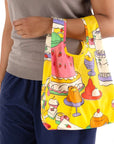 Baggu Baby Baggu - Patisserie - model shown holding product