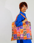 Yellow Owl Workshop Zodiac Art Sack X Steven Fritters - model shown holding product over shoulder