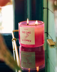 ROEN Candles De Las Flores Scented Candle - product shown lit and on shelf