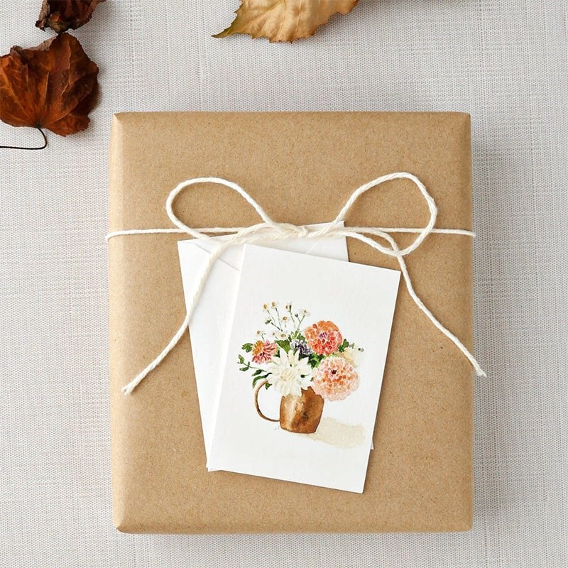 Emily Lex Studio Dahlia Mini Notecard - product on top of present next to leaves