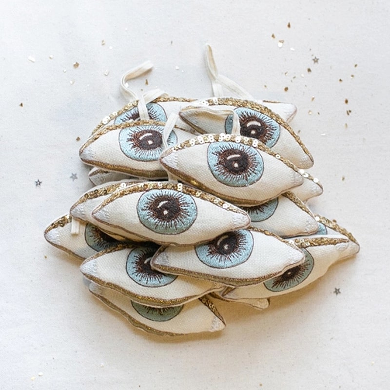 Skippy Cotton Evil Eye - Lavender Scented Token - multiple products stacked in pile