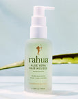 Rahua Aloe Vera Hair Mousse - product shown in front of aloe plant