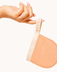 Folia Body Exfoliating Face Mitt - model shown holding product