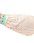 Folia Body Exfoliating Tan Removal Mitt - model shown wearing product on hand