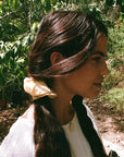 Goose Summer Honey Silk Scrunchie - model shown wearing product