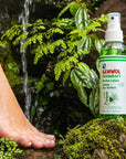 GEHWOL Foot Care Herbal Lotion - product shown near stream and models foot