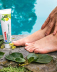 GEHWOL Foot Care Leg Vitality - product shown in front of pool with models foot and hand