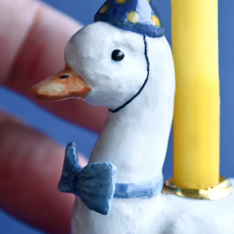 Camp Hollow Blue Goose Cake Topper - close up of products details