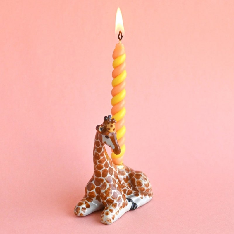 Camp Hollow Giraffe Cake Topper - product shown with lit candle inside