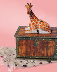 Camp Hollow Giraffe Cake Topper - product shown on top of packaging and bag