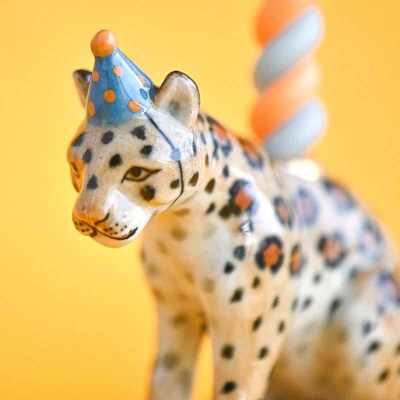 Camp Hollow Jaguar Cake Topper - close up of product details