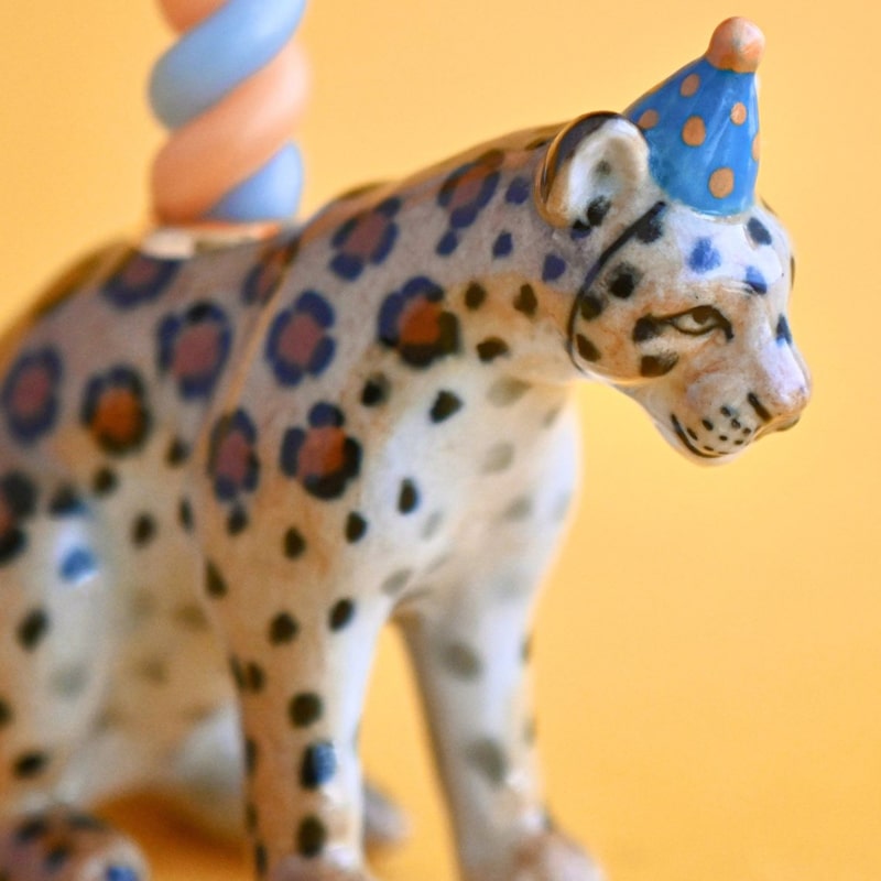 Camp Hollow Jaguar Cake Topper - close up of product details