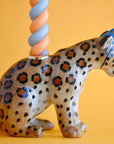 Camp Hollow Jaguar Cake Topper - side view of product shown