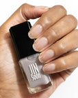 JINsoon Nail Lacquer - Serenity - model shown holding product