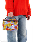 Baggu Puffy Lunch Bag - Floral Snoopy - model shown holding product