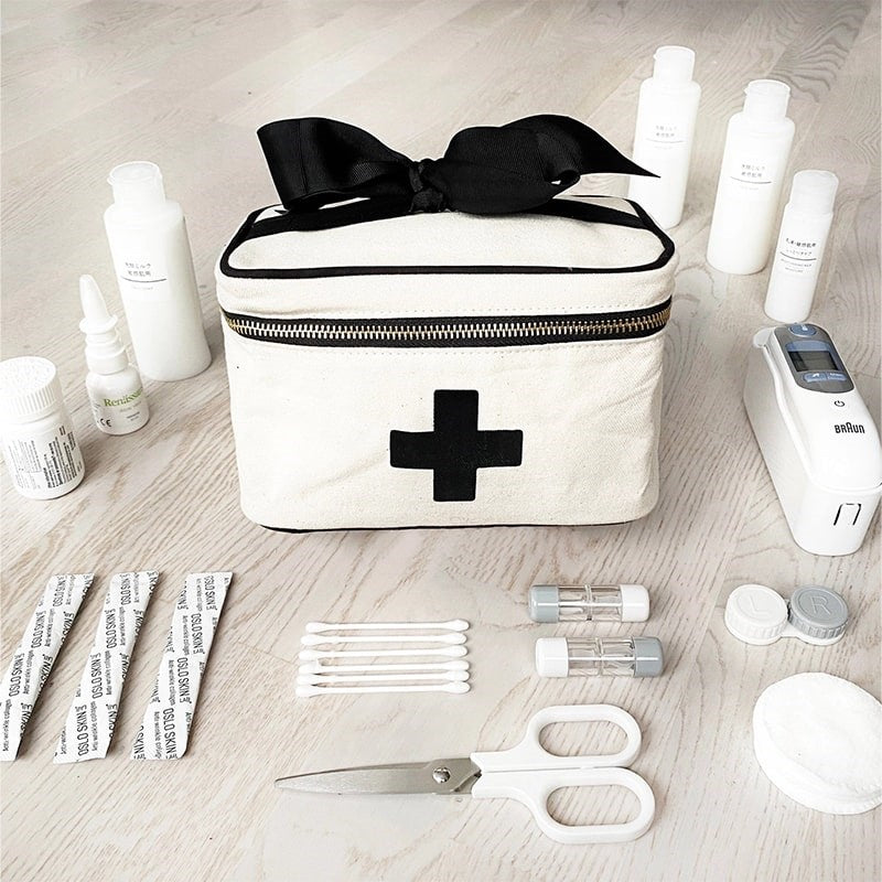 Bag-All Meds and First Aid Storage Box - Cream - product shown next to first aid supplies