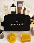 Bag-All My Skin Care Organizing Pouch - Black - product shown surrounded by beauty products